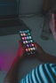 person holding black remote control