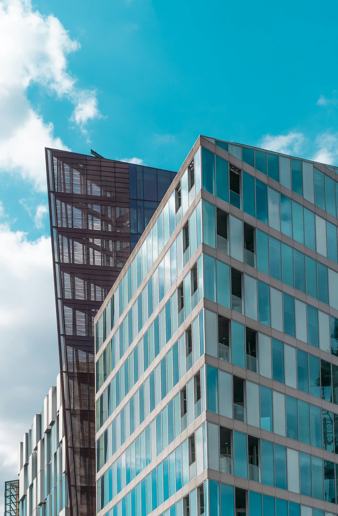 white and brown concrete building under blue sky during daytime