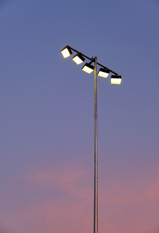 black street light under blue sky during daytime