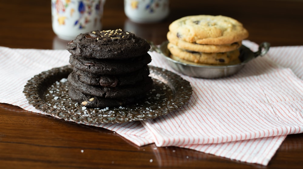 chocolate cookies on clear glass plate