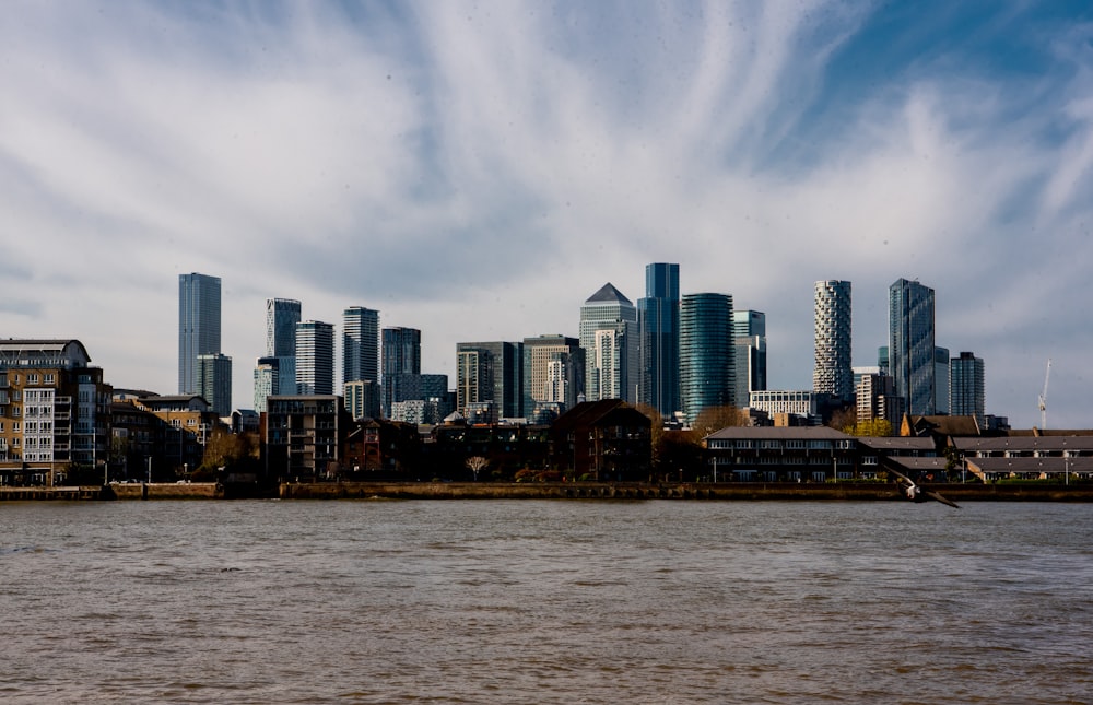 city skyline under blue sky during daytime