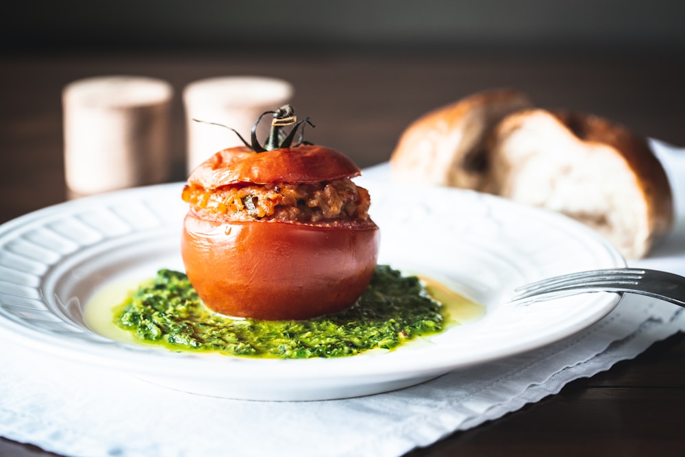 brown and green dish on white ceramic plate