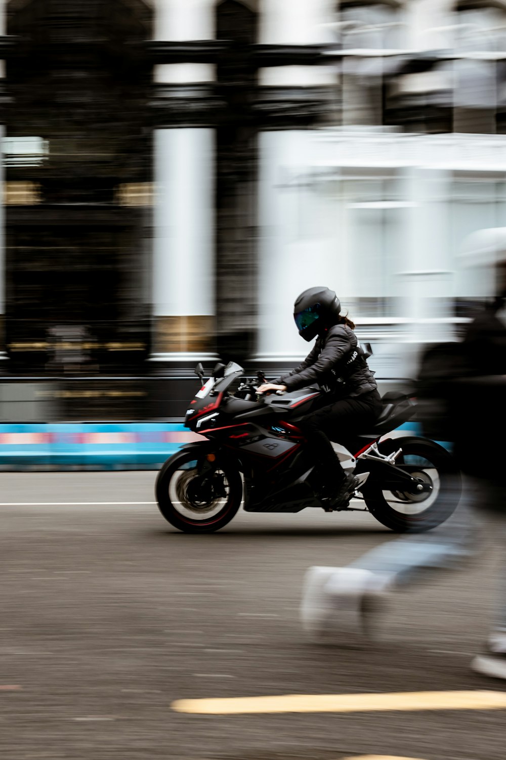 man in black jacket riding motorcycle