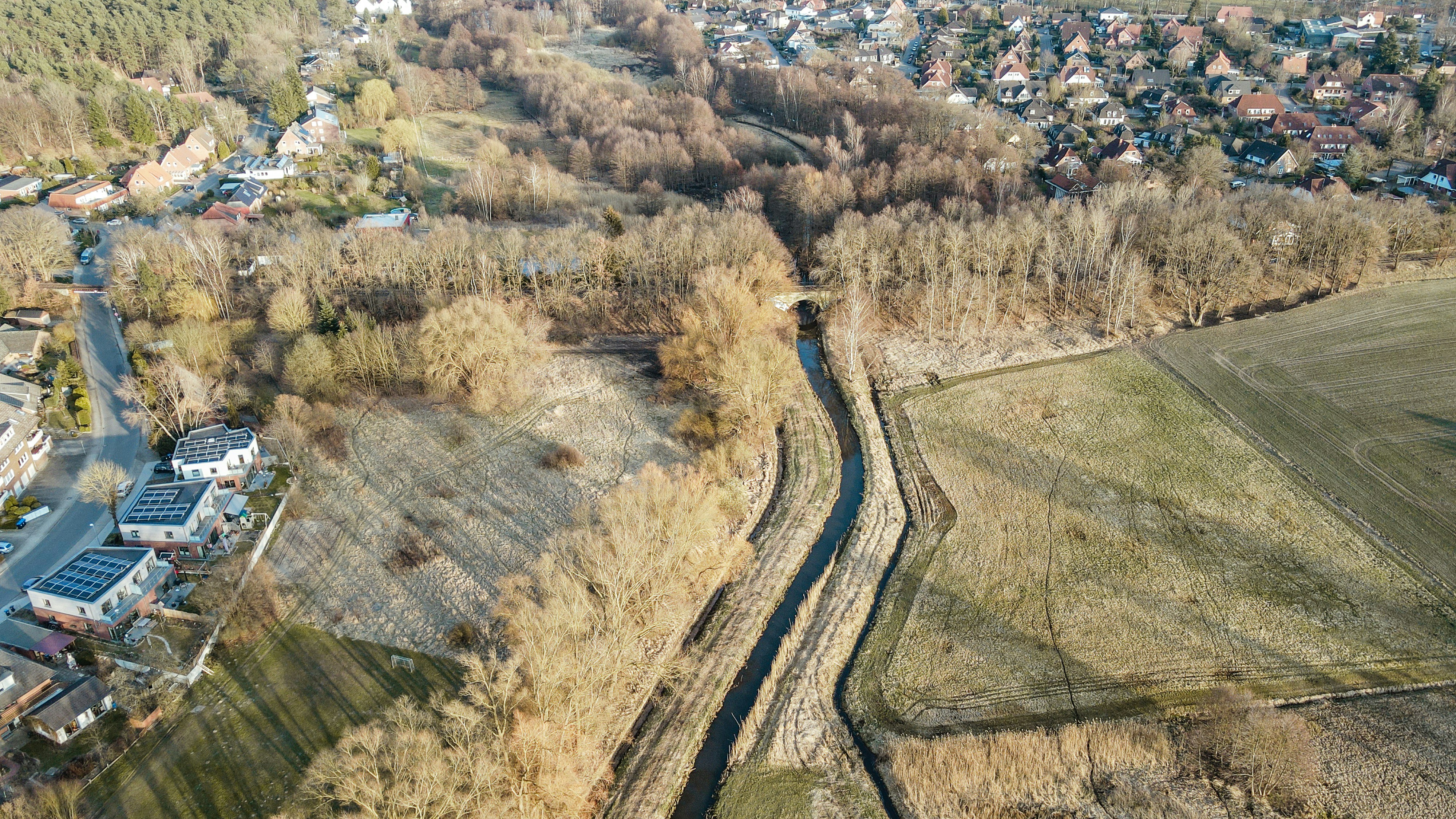 aerial view of green and brown field during daytime
