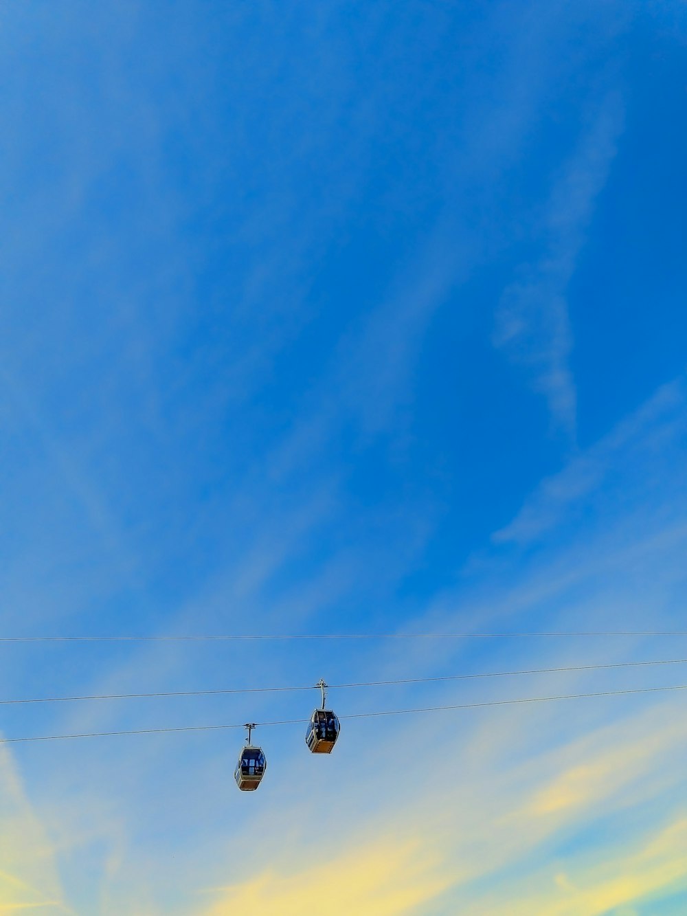 black street light under blue sky during daytime