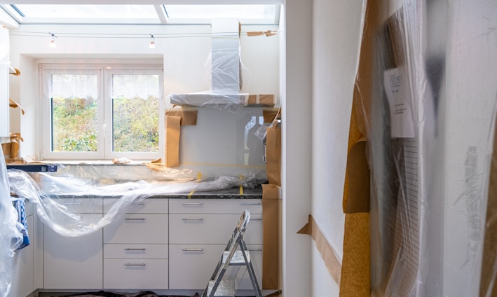 white wooden cabinet near window