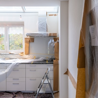 white wooden cabinet near window