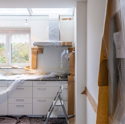 white wooden cabinet near window