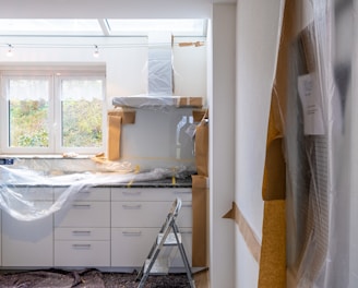 white wooden cabinet near window