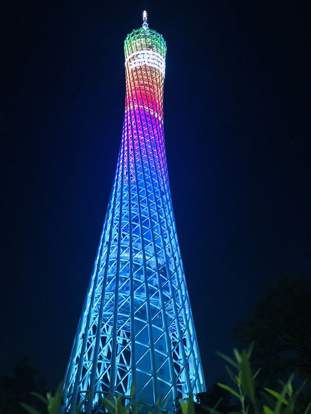 blue lighted tower during night time