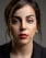 woman with red lipstick and black mascara