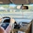 person driving car during daytime