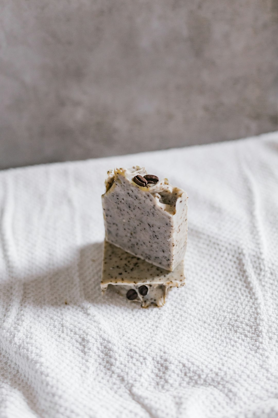 brown and white bread on white textile