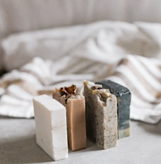 white and brown cake on white textile