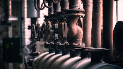 grayscale photo of metal pipe