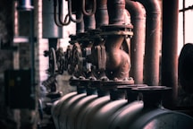 grayscale photo of metal pipe