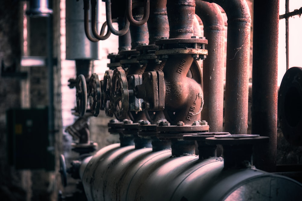 grayscale photo of metal pipe