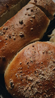 Close-up of a freshly baked golden crust bread with steam rising