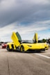 yellow ferrari 458 italia on road during daytime
