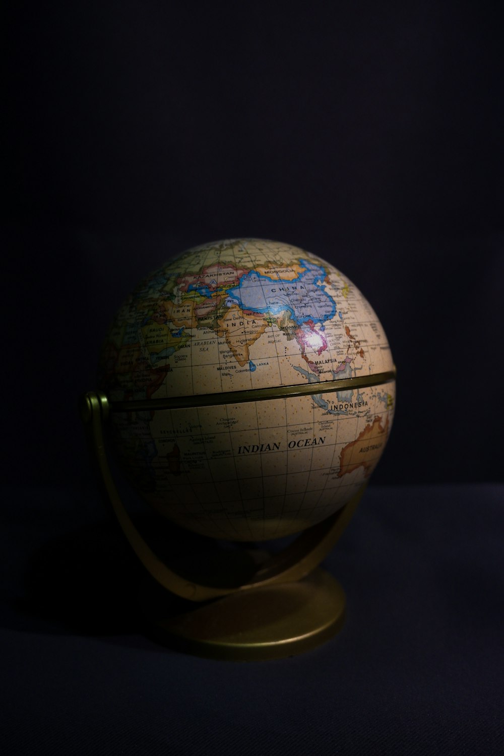 blue and brown desk globe