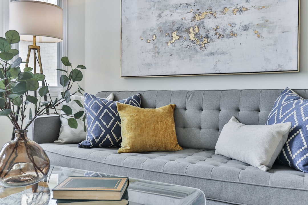 white and gray floral sofa