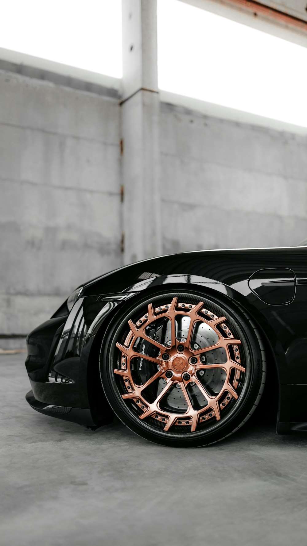 black car with brown wheel