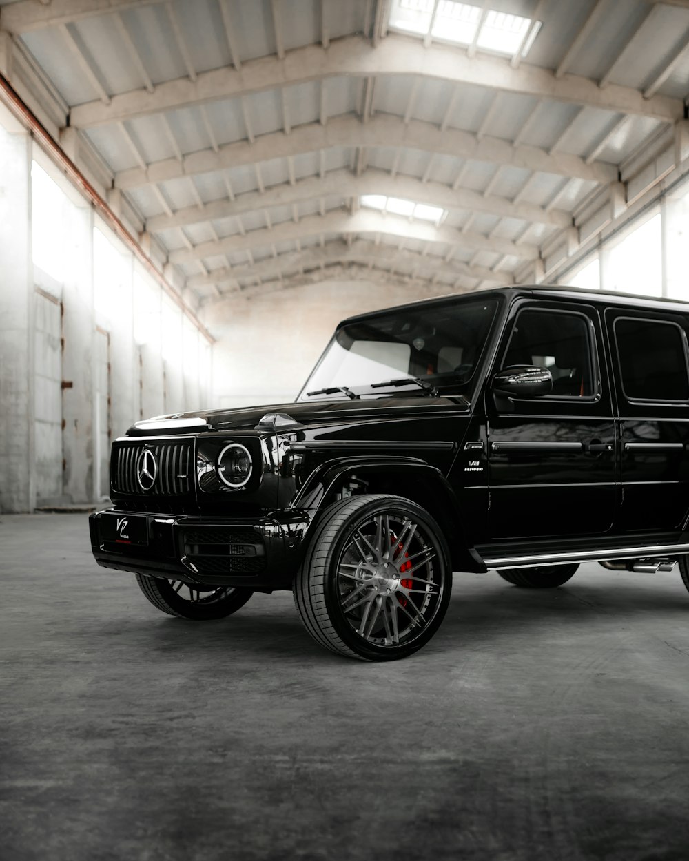 black suv parked in garage