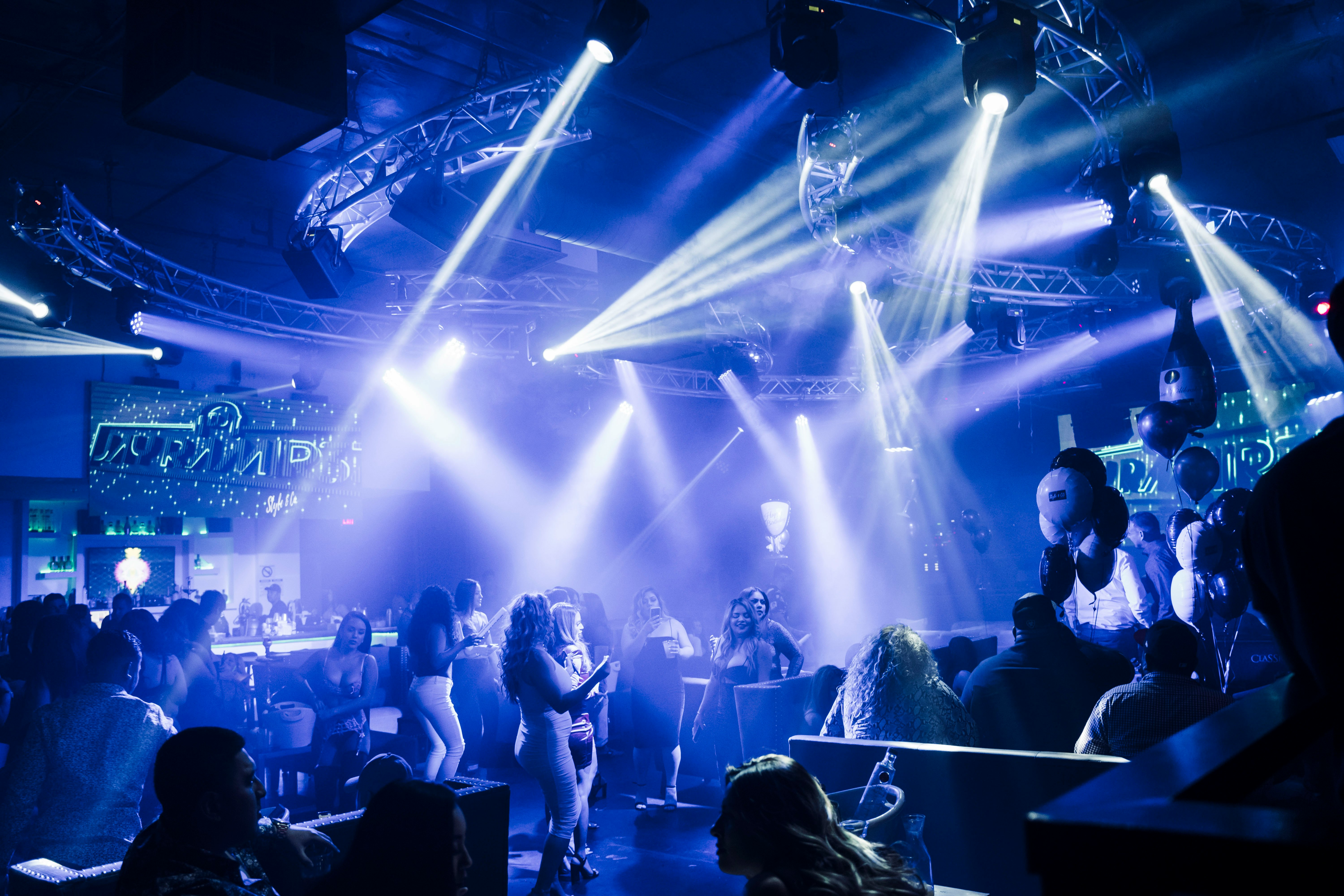 people standing on stage during night time