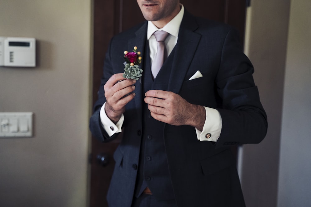 man in black suit jacket