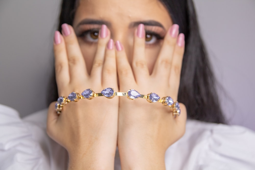 woman with silver and gold rings