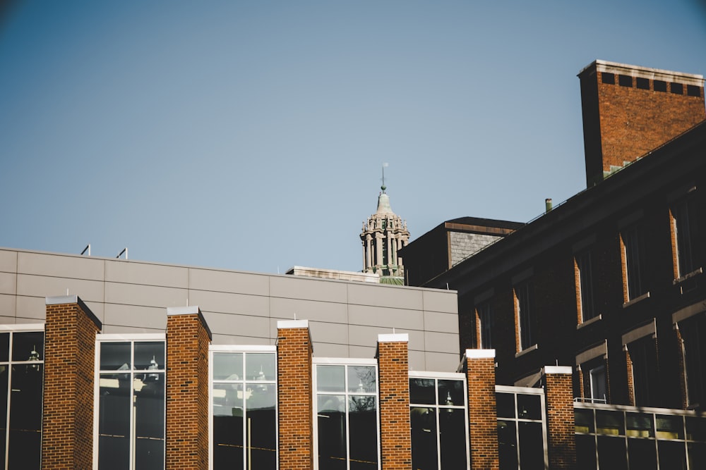 brown concrete building under blue sky during daytime