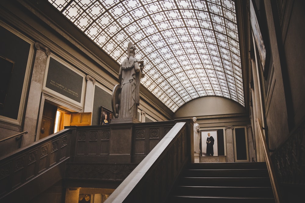 gray concrete statue inside building