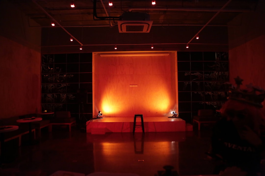 red lighted stage with red light, Stand up comedy stage lighting