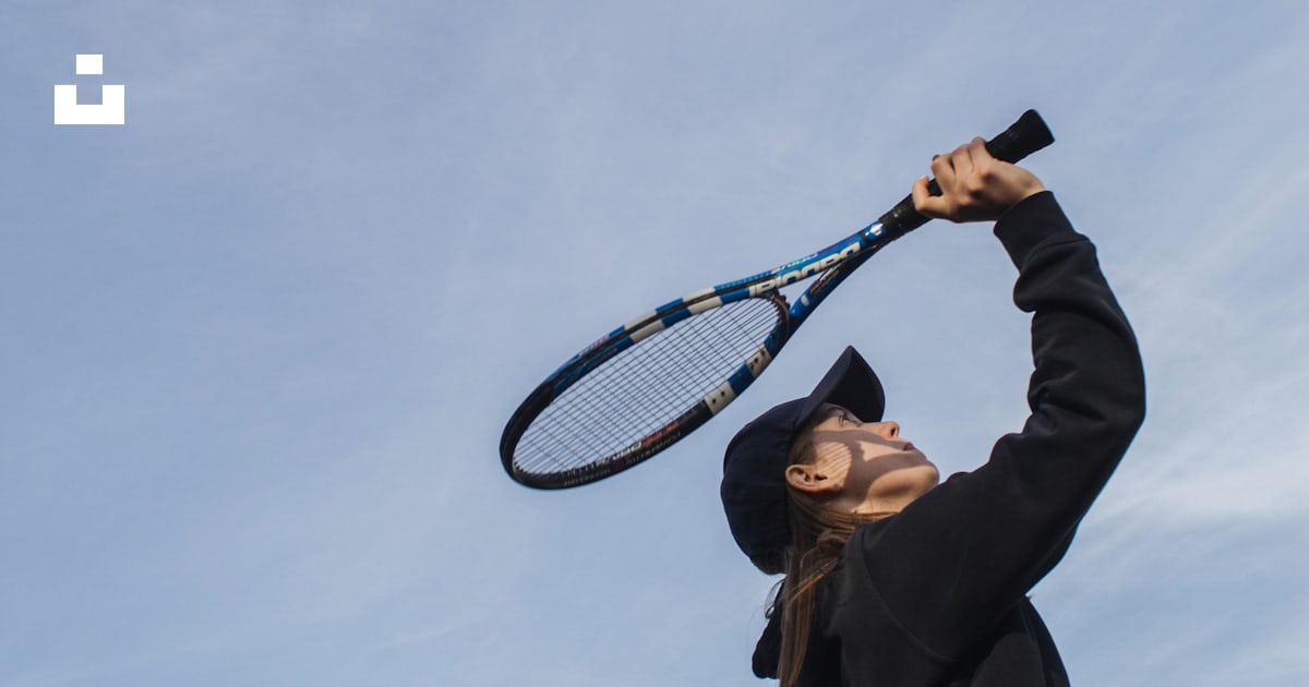 Man in black jacket holding tennis racket photo – Free Tennis racket ...