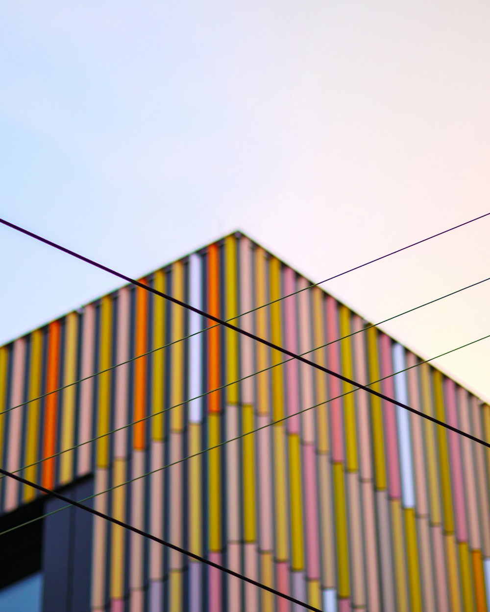 black and white building under blue sky