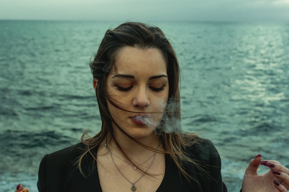 woman in black shirt with silver necklace