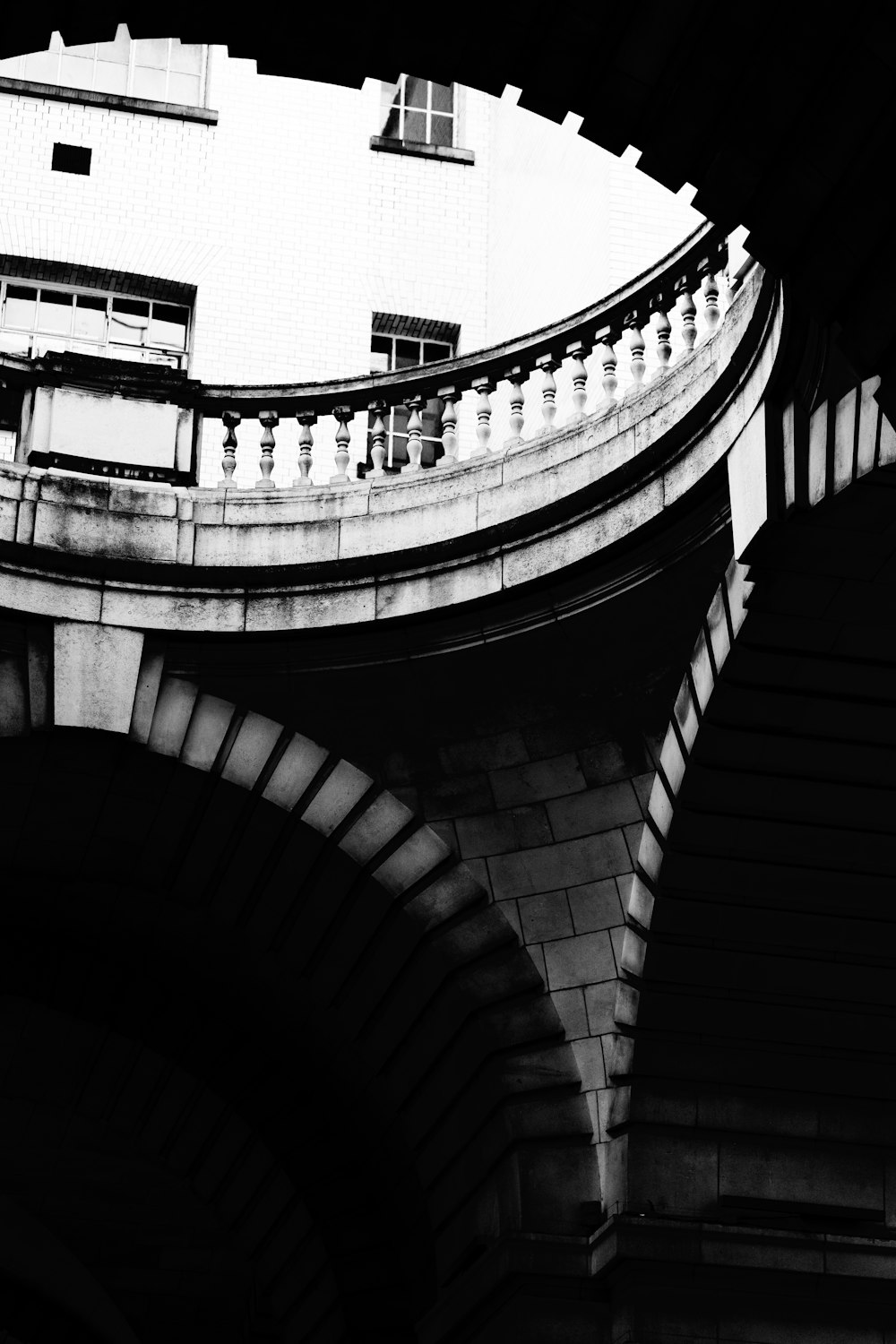 grayscale photo of concrete building