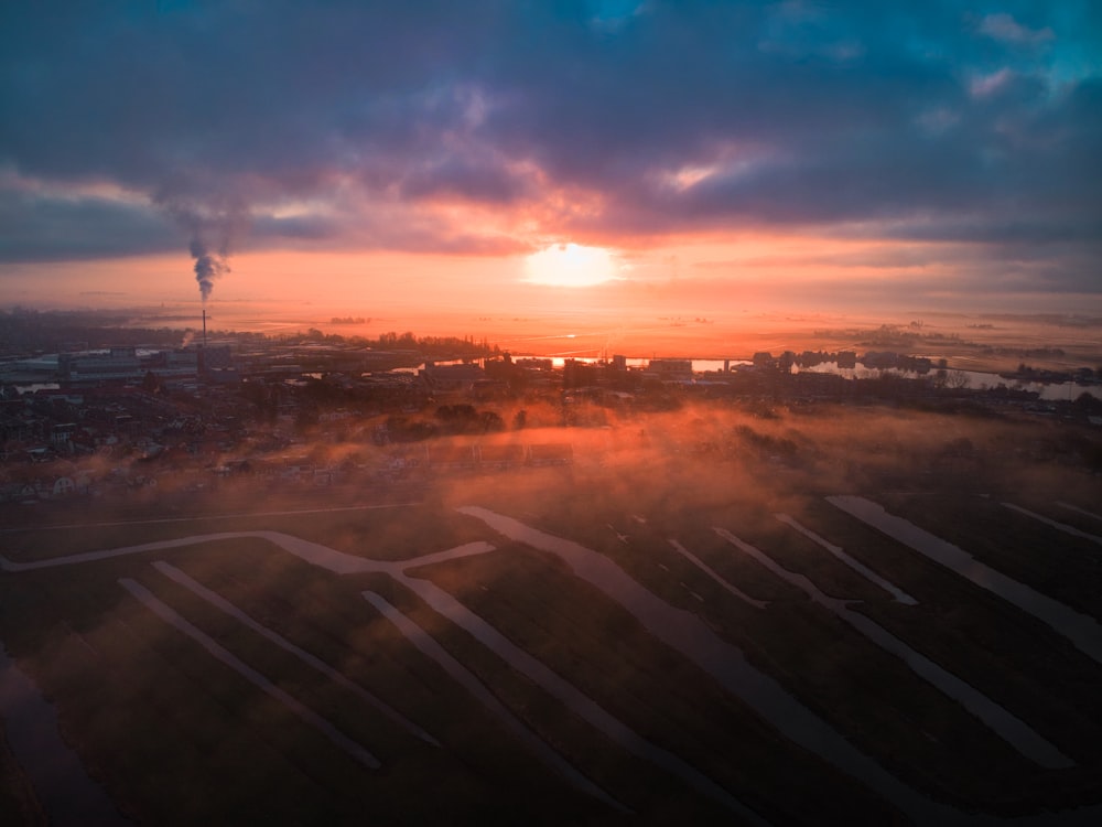 aerial view of city during sunset