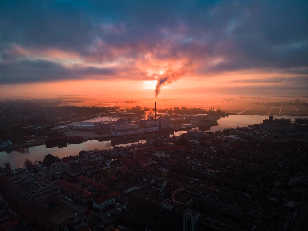 city buildings under blue sky during sunset