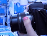 A close-up of a photographer capturing a product shot.