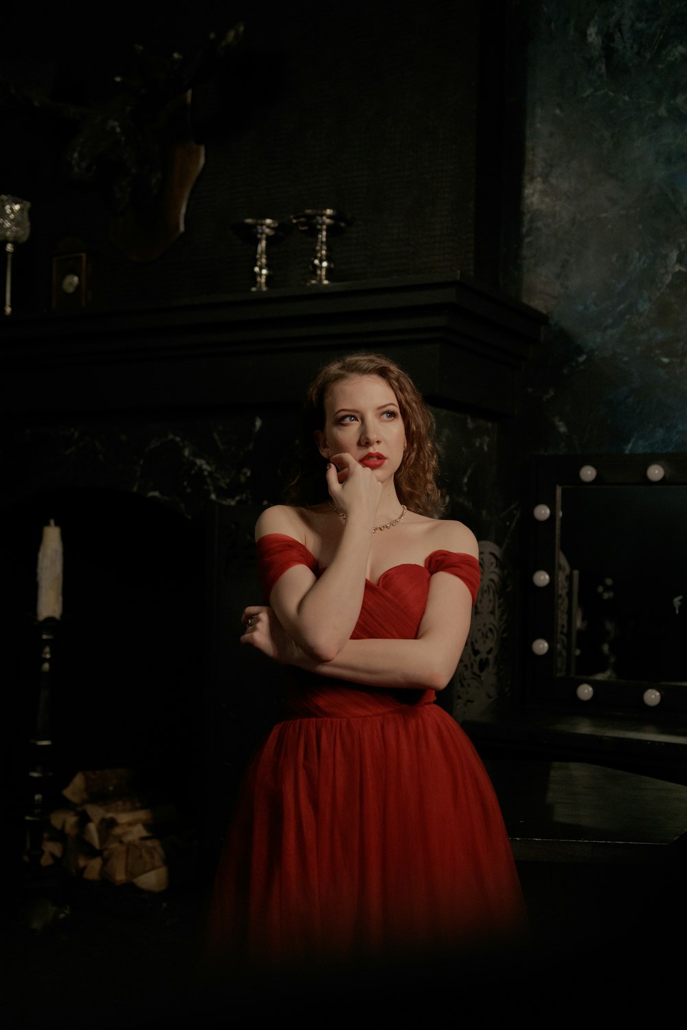 woman in red sleeveless dress