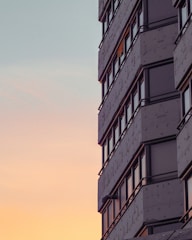 Modern luxury residential building facade at sunset in Mexico City.