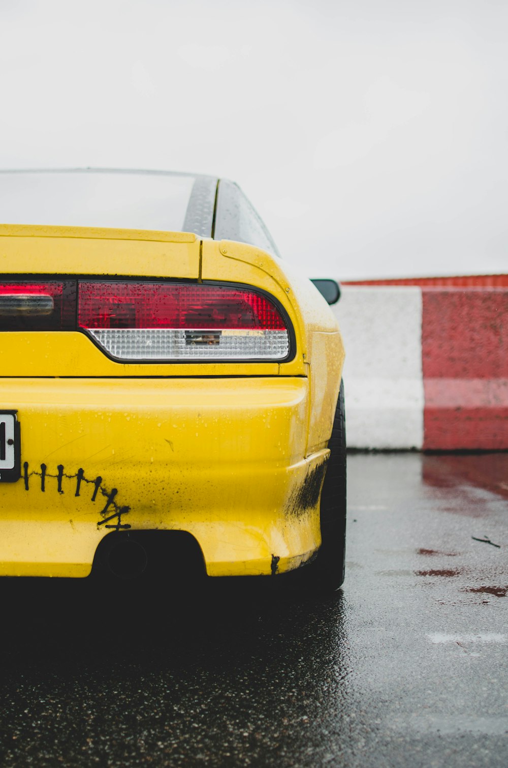 yellow porsche 911 on road during daytime