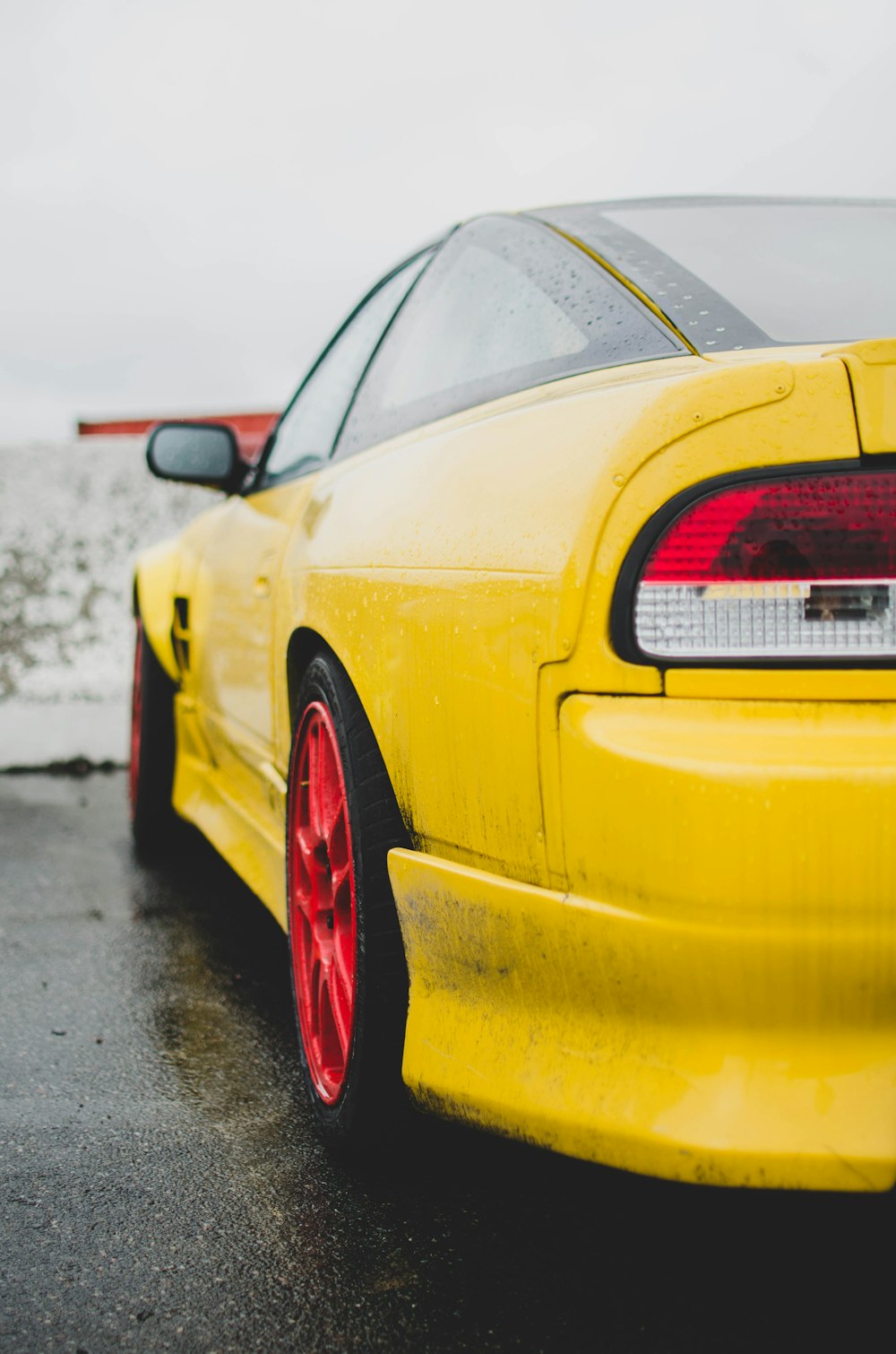 yellow porsche 911 on road during daytime