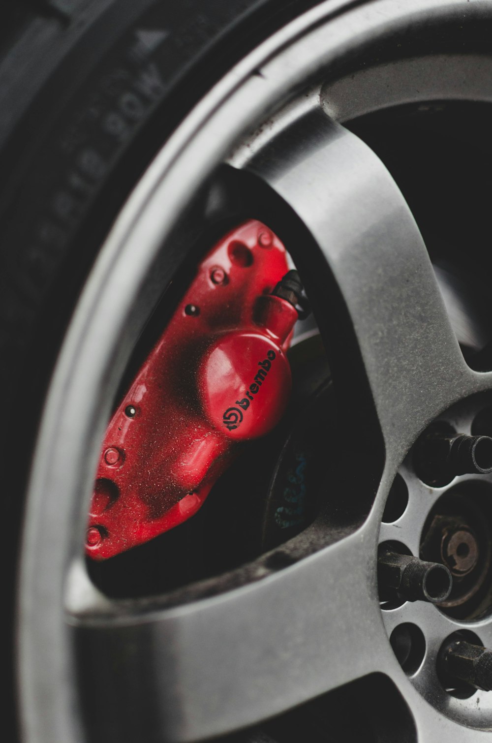 red and silver car wheel