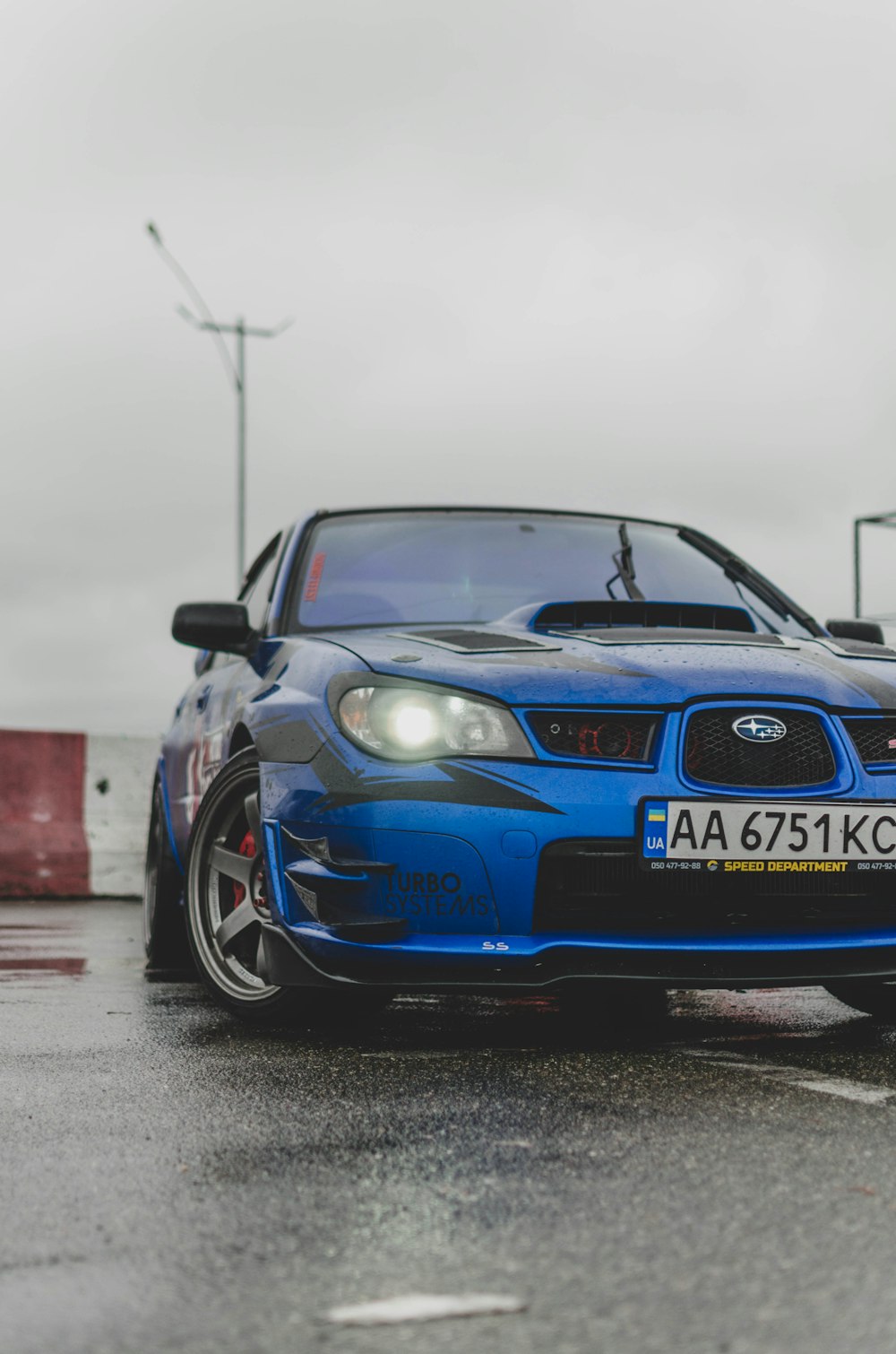 blue bmw m 3 on road during daytime