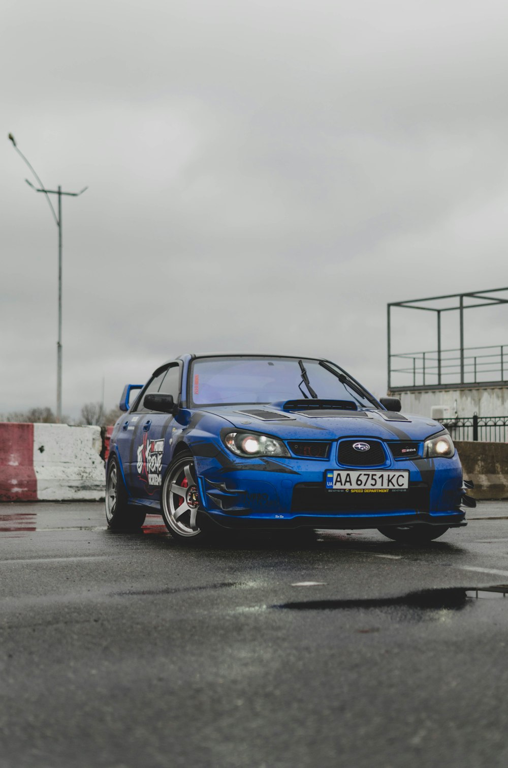 blue bmw m 3 on road