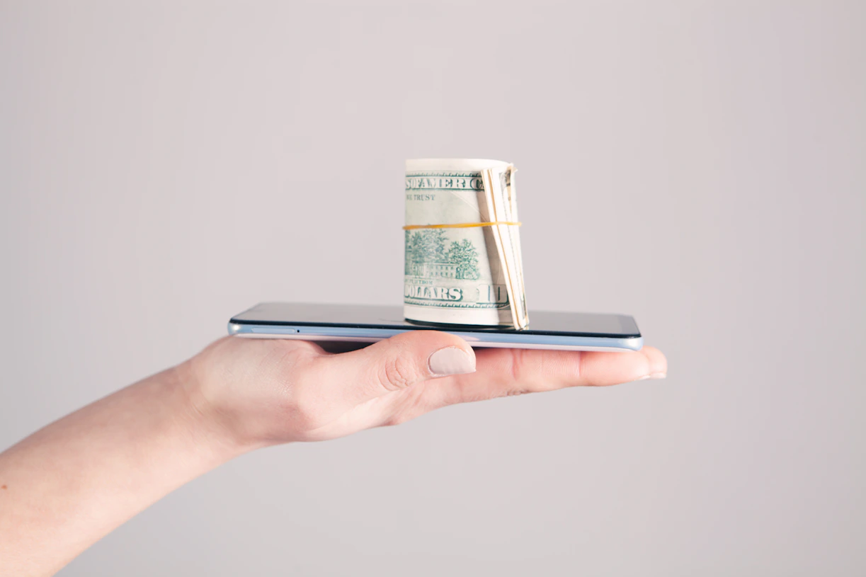 person holding silver iphone 6