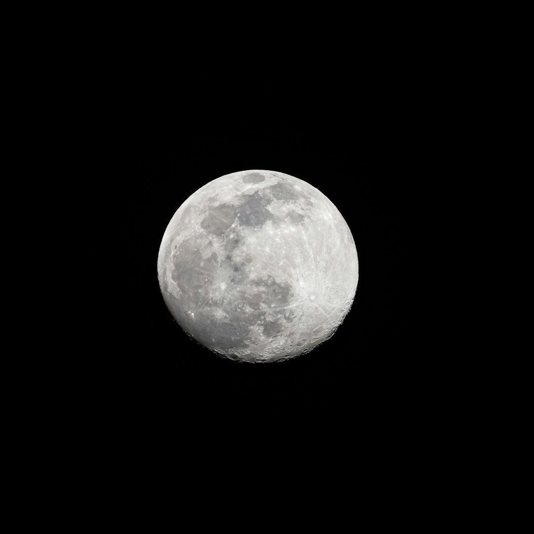 full moon in dark night sky