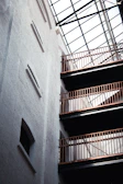 Interior view of Studio Paolina 1 showcasing exposed brick walls and vaulted ceilings.
